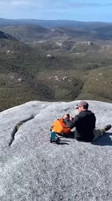 Reaching a Summit and Feeling Rewarded After a Challenging Hike · In the Theatre of the Gogs