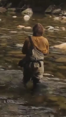 A team member attempts to catch a trout following Lars Lenth's footsteps: Only the River Knows