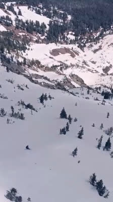 Alex Maier snowboards in Northern Bridgers in July: Learning to Splitboard the Northern Rockies