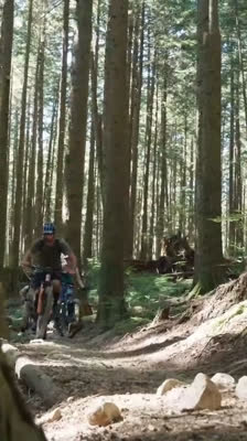 Anthony, mountain biker, stands at the base of his final mountain, Burke - Only A Ride