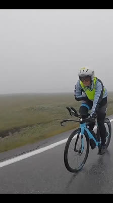 Carolina Laurentiu faces the cold during the cycling segment of the Norseman · Norseman